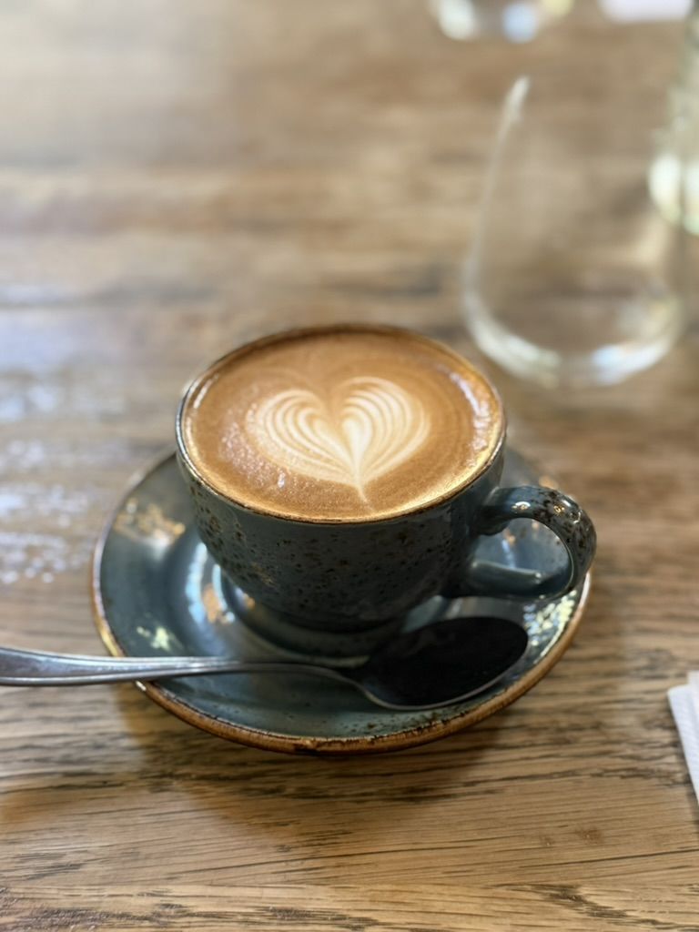 A flat white with latte art